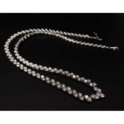 295 - A Breath-Taking 10ct Diamond and Platinum Necklace. Over 180 quality round cut diamonds in a wonderf... 