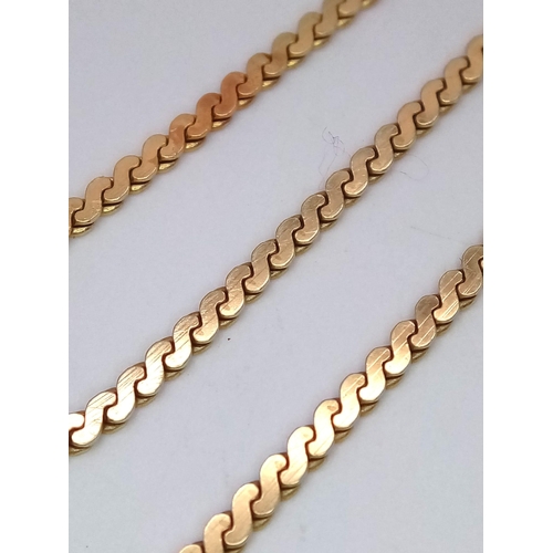 1079 - An Italian 14K Yellow Gold Flat S-Link Necklace. 43cm length. 8.67g weight. Note: Clasp, with minima... 