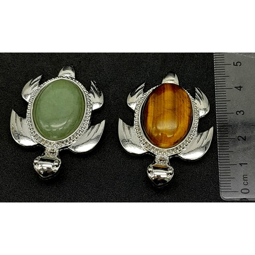 1086 - Two Gemstone Turtle Pendants - Jade and Tigers Eye. 5cm x 4cm.