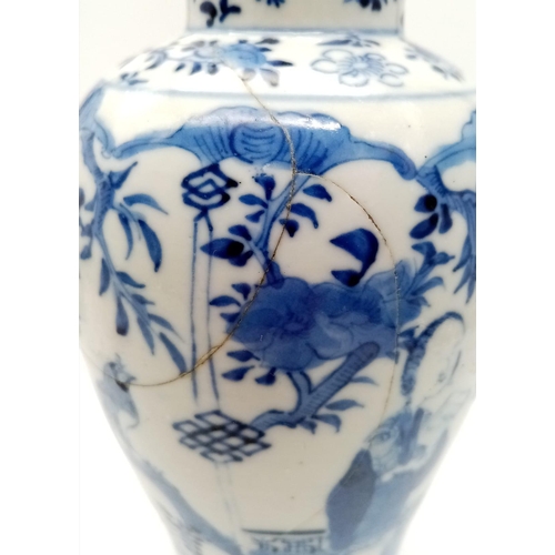 1169 - An Antique Chinese Vase. 
Depicting an ancient scene between two Chinese gentlemen reading, and most... 