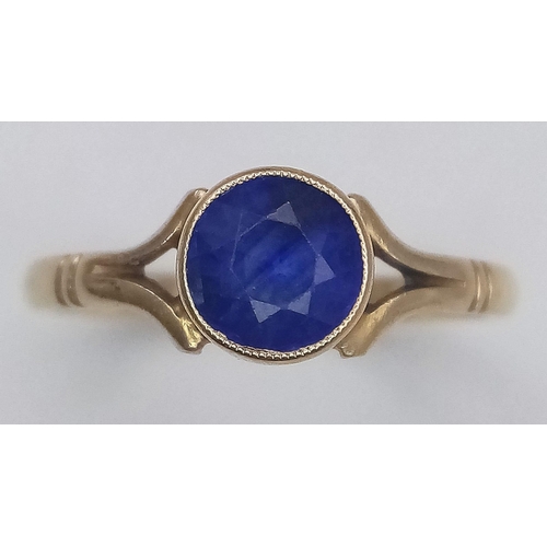 1675 - A Vintage 9K Yellow Gold Sapphire Solitaire Ring. Size M. 1.85g total weight.