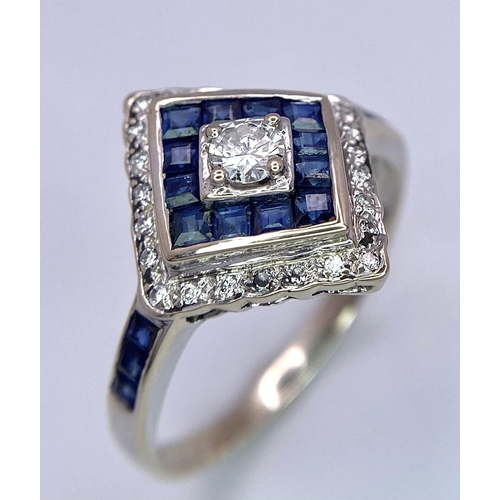 253 - A Platinum, Diamond and Sapphire Ring. Central round cut diamond with a square cut sapphire and furt... 