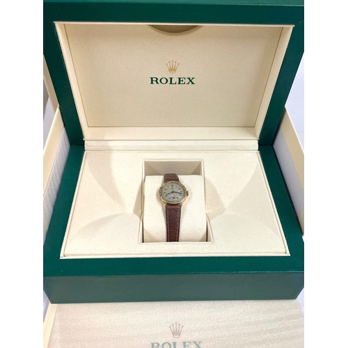 360 - A vintage 18ct gold ladies Rolex Tudor with Rolex box, circular cream face with black dials and leaf... 