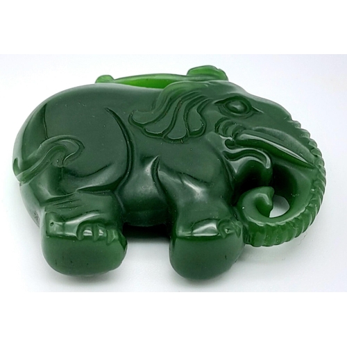 549 - A Green Jade Chinese Hand-Carved Elephant Pendant. 5cm x 4cm.