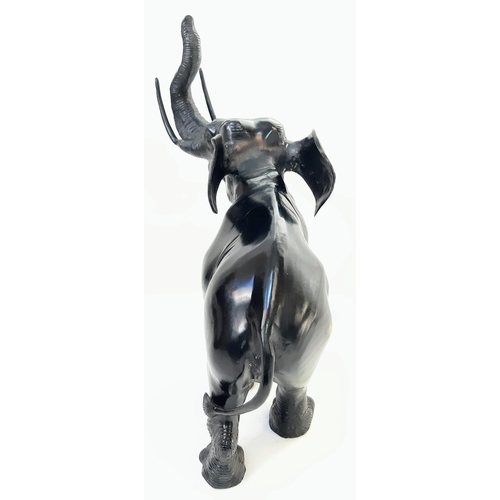 589 - Beautiful Bronze Black Elephant. 
Standing at 52cm tall, this majestic bronze elephant with raised t... 