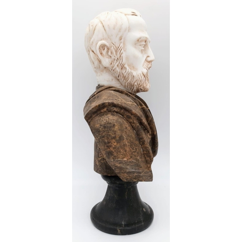 631 - A Marble Bust of Distinct Grandeur. 
A black marble base, leads to a wonderfully selected veiny brow... 