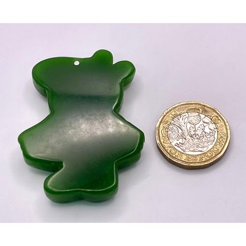 726 - A Cute Peppa Pig Green Jade Pendant. 5cm.