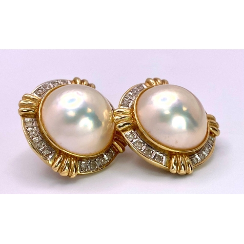 78 - A Pair of Very Attractive 14K Yellow Gold, Pearl and Diamond Earrings. Two South Sea Pearl Cabochons... 