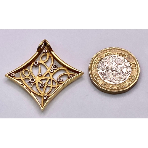 94 - A Decorative Celtic 18K Yellow Gold and Diamond Pendant. 
3.5cm x 3.5cm. 7.48g total weight.