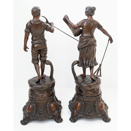 995 - A charming pair of Victorian Smelted Bronze Statues.
Both workers, this man & woman have spent the d... 