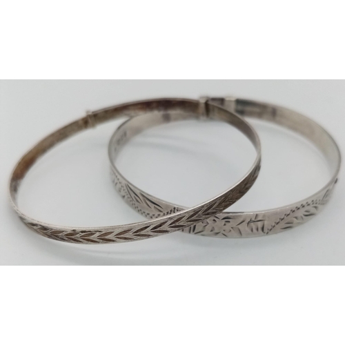 1503 - A collection of vintage sterling silver adjustable baby bangles. Some of them have Birmingham and Lo... 