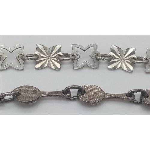 1587 - 2X vintage sterling silver bracelets. One with four-leaf clover link and the other one with tennis r... 