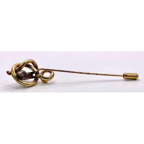 1622 - An Antique Mid-Carat Gold Hat Pin with cute little creature accent.
Measuring 9cm in length and weig... 