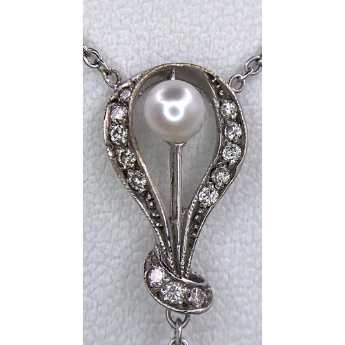 163 - An 18KT White Gold Necklace with a Tahitian Pearl, 5.5CTW Diamond encrusted Pendant. The beautifully... 