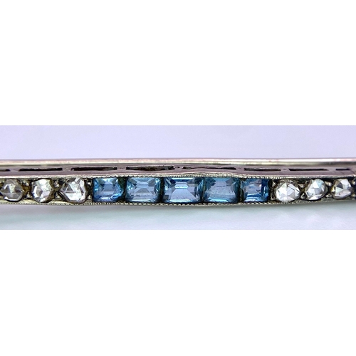 1636 - An 18kt White Gold Brooch set with Topaz, Diamond & Aquamarine Stones.
Comes in used condition, meas... 