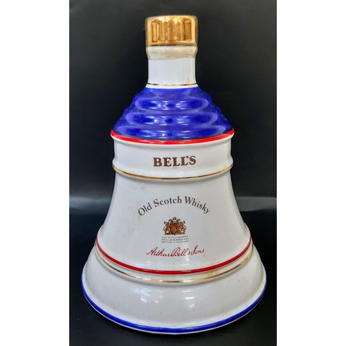 1647 - A Bottle of Commemorative Bells 43% Scotch Whisky 1988 75cl, in Wade Porcelain Decanter.