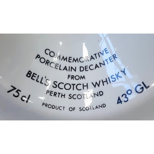 1654 - A Bottle of Commemorative Bells 43% Scotch Whisky 1986 75cl, in Wade Porcelain Decanter.