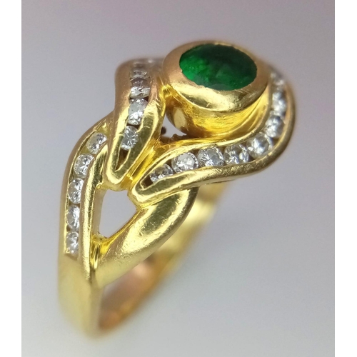 184 - An 18K Yellow Gold Emerald and Diamond Ring. Central oval emerald eye with beautiful diamond lids! 3... 