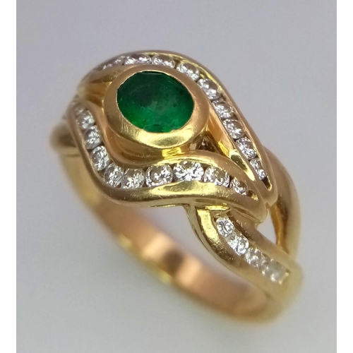 184 - An 18K Yellow Gold Emerald and Diamond Ring. Central oval emerald eye with beautiful diamond lids! 3... 