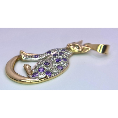 305 - A 9K Yellow Gold Amethyst and White Stone Decorative Cat Pendant. 6cm. 9.75g total weight.