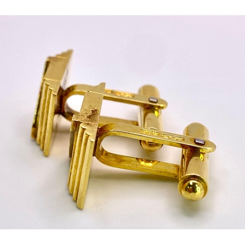 312 - A Pair of 14K Yellow Gold and Diamond Cufflinks. Rich gold, rectangular cufflinks with a decorative ... 