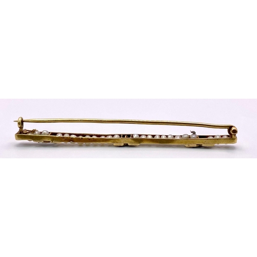 319 - An Antique Mid-Karat Gold, Pearl and Diamond Bar Brooch.
6.5cm length. 5.24g total weight.