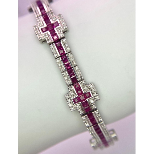 37 - A Captivating 18K White Gold, Ruby and Diamond Ladies Tennis Bracelet. 112 Square cut rubies and 300... 