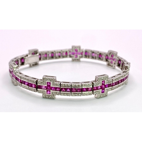 37 - A Captivating 18K White Gold, Ruby and Diamond Ladies Tennis Bracelet. 112 Square cut rubies and 300... 