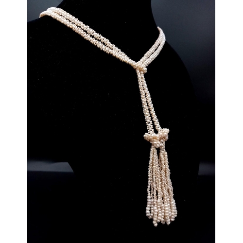 499 - A Fabulous South Sea Seed Pearl Rope Length Necklace Wrap - with Tasselled Ends. 98cm length. 20.6g ... 