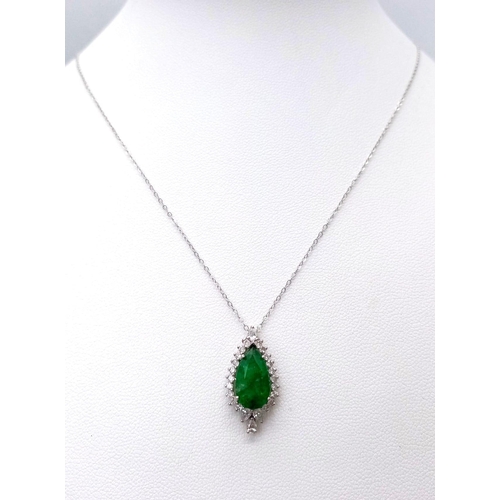 513 - An 18K White Gold, Emerald and Diamond Teardrop Pendant on a 9K White Gold Disappearing Necklace. Pe... 