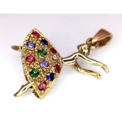 712 - A 9kt Yellow Gold Jewelled Dancing Ballerina Charm/Pendant.
Measures 3cm in length.
Weight: 5.06g