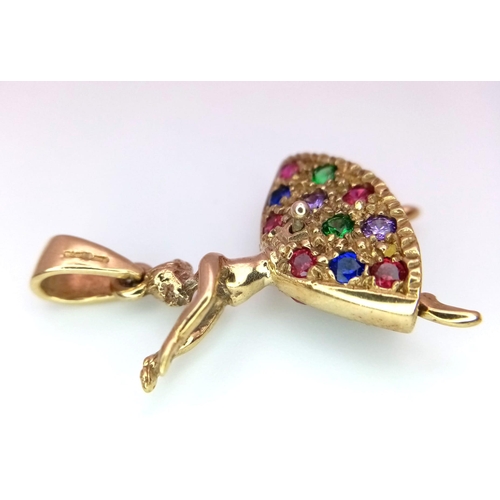 712 - A 9kt Yellow Gold Jewelled Dancing Ballerina Charm/Pendant.
Measures 3cm in length.
Weight: 5.06g