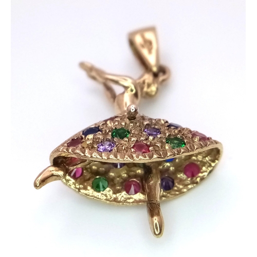 712 - A 9kt Yellow Gold Jewelled Dancing Ballerina Charm/Pendant.
Measures 3cm in length.
Weight: 5.06g