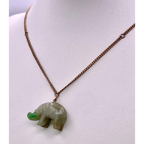 898 - A Jade Hippopotamus Pendant on a 9K Yellow Gold Necklace. 
2cm pendant. 42cm necklace. 8.53g total w... 