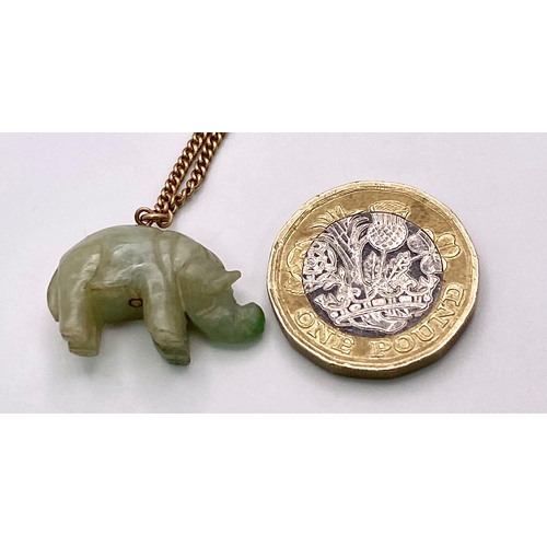 898 - A Jade Hippopotamus Pendant on a 9K Yellow Gold Necklace. 
2cm pendant. 42cm necklace. 8.53g total w... 