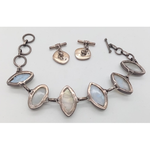 1131 - A set of 925 silver Mother of pearl jewellery include: a pair of cufflinks and a bracelet with 21cm ... 