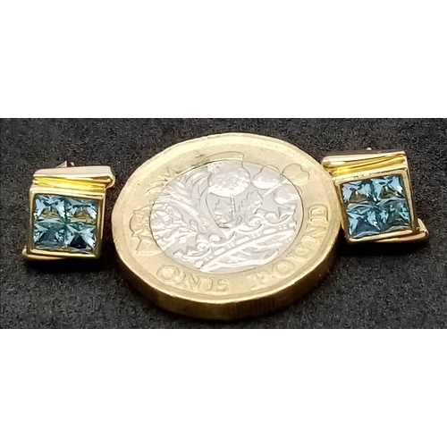 1178 - A Pair of 10K Yellow Gold Aquamarine Stud Earrings. 2.63g total weight.