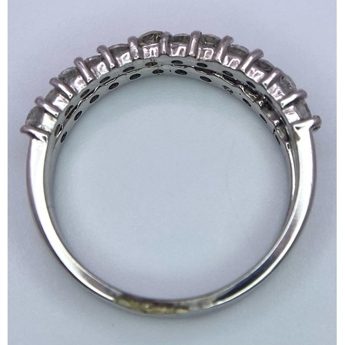 123 - A 14K WHITE GOLD DOUBLE ROW DIAMOND RING. SIZE N/O, 0.96CTW, 4.1G TOTAL WEIGHT.    Ref: SC 7018