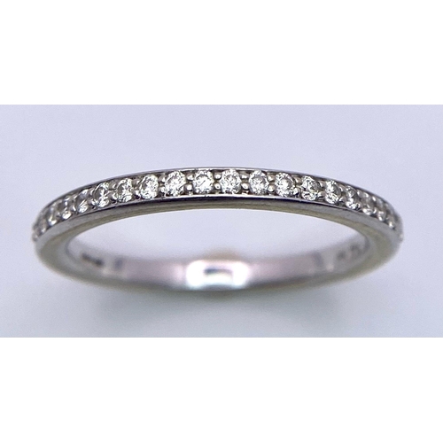 144 - AN 18K GOLD DIAMOND BAND RING. SIZE M, 0.20CTW, 2.6G TOTAL WEIGHT.    Ref: SC 7021