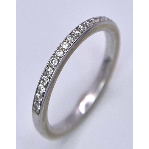 144 - AN 18K GOLD DIAMOND BAND RING. SIZE M, 0.20CTW, 2.6G TOTAL WEIGHT.    Ref: SC 7021