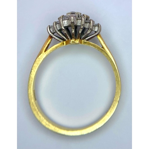 257 - AN 18K GOLD DIAMOND CLUSTER RING WITH .35ct DIAMOND .    3.1gms   size M