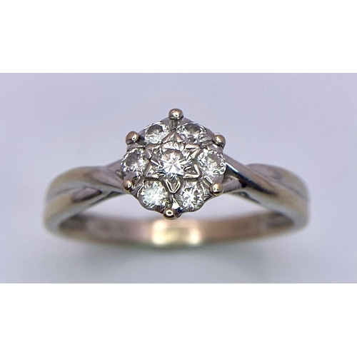 362 - AN 18K WHITE GOLD DIAMOND CLUSTER RING. SIZE J/K, 0.26CTW, 2.2G TOTAL WEIGHT.    Ref: SC 7027