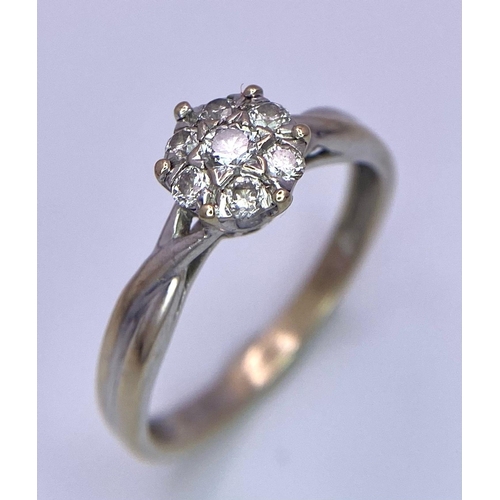 362 - AN 18K WHITE GOLD DIAMOND CLUSTER RING. SIZE J/K, 0.26CTW, 2.2G TOTAL WEIGHT.    Ref: SC 7027