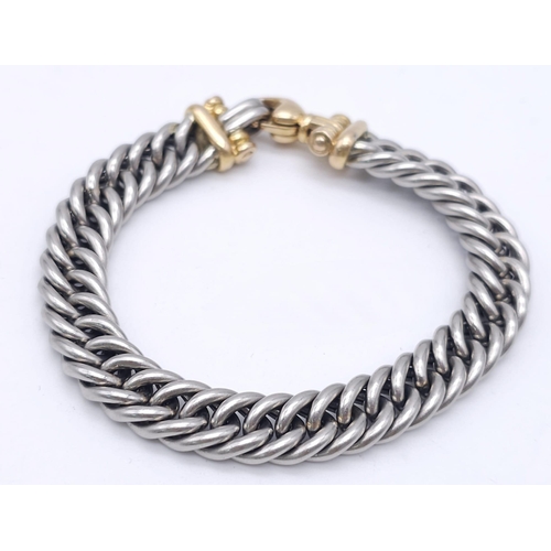 562 - A Beautifully Constructed Platinum and 18K Gold (tested) Curb Link Bracelet. 18cm. 50.3g total weigh... 