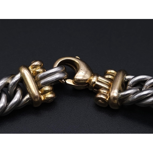 562 - A Beautifully Constructed Platinum and 18K Gold (tested) Curb Link Bracelet. 18cm. 50.3g total weigh... 