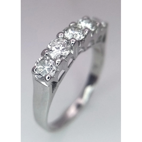 583 - An 18K White Gold and Five Stone Diamond Ring. Quality brilliant round cut diamonds - near white. Si... 