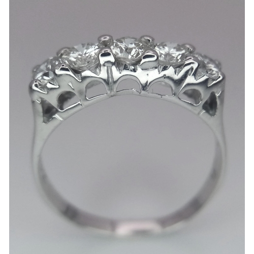 583 - An 18K White Gold and Five Stone Diamond Ring. Quality brilliant round cut diamonds - near white. Si... 