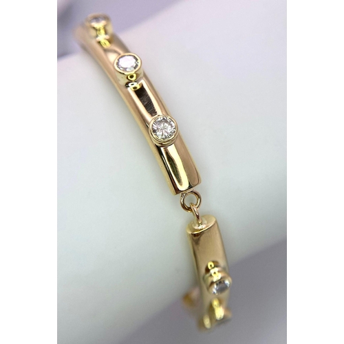 1251 - An 18K Yellow Gold (Tested) Diamond Bar Tennis Bracelet. 1.2ctw of bright round cut diamonds. 17cm. ... 