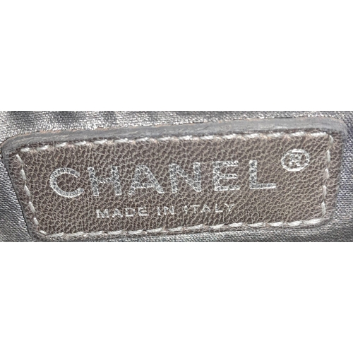 1368 - Chanel Moscow Flap.
Quality lambskin leather throughout with silver toned hardware. Soft quilted fro... 