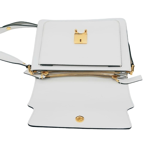 1376 - Marni Mini Trunk Cross-Body Bag.
Saffiano calfskin, back pocket and inside pocket with 5 internal co... 